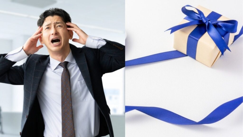 ホワイトデーのお返しにゴディバは嬉しくないか悩みスマホで検索する男性と2026年のギフトイメージ